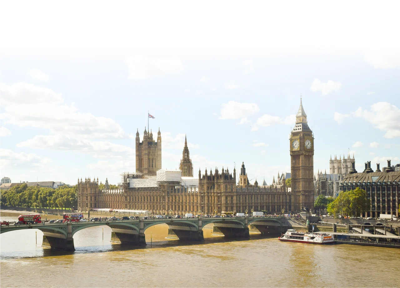 The Palace of Westminster, Elizabeth Tower and Westminster Bridge beside the River Thames